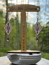 Load image into Gallery viewer, Diamond shaped peyote stitched earrings w/Amethyst Swarovski in 3 sizes, delicas in pink gold iris ab &amp; metallic tea berry gold iris