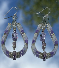 Load image into Gallery viewer, Swarovski lilac butterfly centers w/charlotte cut silver, purple, lilac, pearl beads and column purple faceted beads. On silver hooks with crystal embellishment.