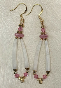 Dentalium shells with Rose Swarovski and Japanese crystals (2 sizes), gold drop bead and 3 hole oval bead. On gold plated hooks.