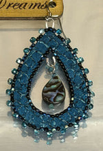 Load image into Gallery viewer, Teardrop abalone teal metallic fish skin earrings. Patina opaque black blue AB, teal mirror 2mm faceted beads, teal faceted stones. On silver hooks