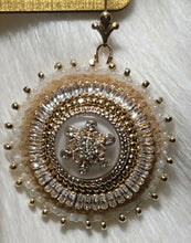 Load image into Gallery viewer, *Dazzling*sparkling* beauties on moose skin, backed w/dyed white salmon skin w/ gold. Encircled and edged w/sz 11 true cut 24k gold plated seeds and Charlotte cut alabaster opaque seeds. Also encircled with 3A grade cubic zirconia baguette chain banding