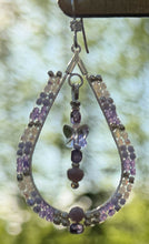 Load image into Gallery viewer, Swarovski lilac butterfly centers w/charlotte cut silver, purple, lilac, pearl beads and column purple faceted beads. On silver hooks with crystal embellishment.