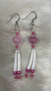 Rose Swarovski crystals with natural round stone bead, fuchsia pearls, sterling silver beads and Dentalium. On hypoallergenic hooks.