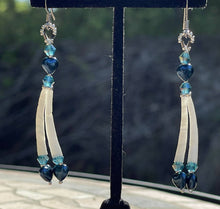Load image into Gallery viewer, Dentalium earrings w/Blue pearl hearts, medium blue Australian crystals, size 15 and 11 sterling silver beads. On hypoallergenic hooks.