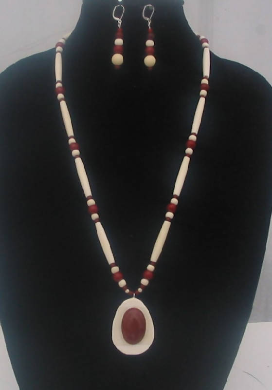 Ivory and bone necklace with red jasper