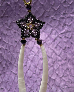 24k gold and lavender Charlotte cut size 15 and dark purple Toho size 15 with dentalium and 2 sizes of crystals with gold teardrop bead on gold filled hooks. Measures 3 1/4” top to bottom
