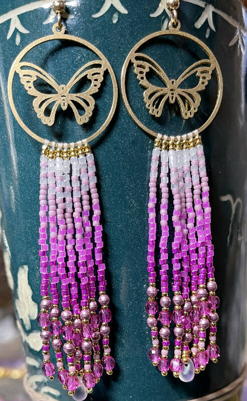 Pinks and butterflies-beauty in 3 shades of pinks, pale pink druks, fuchsia facets and frosted drop beads AND sz 15 Charlotte cut 24k gold beads. On gold filled hooks