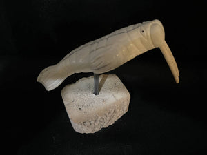 Walrus ivory swimming walrus whale bone base