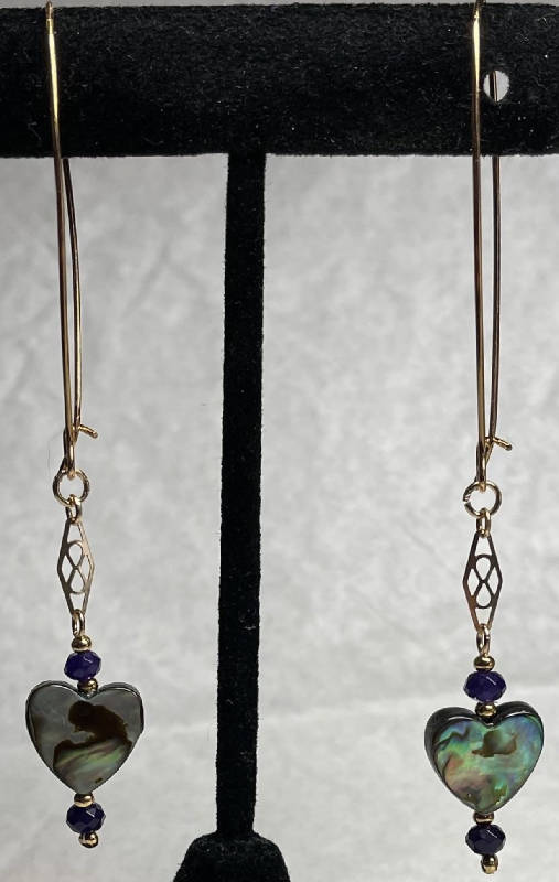 Abalone hearts w/dark orchid jade beads & 24k gold plated beads and gold decorative plates. On kidney hooks.