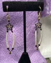 Load image into Gallery viewer, 24k gold and lavender Charlotte cut size 15 and dark purple Toho size 15 with dentalium and 2 sizes of crystals with gold teardrop bead on gold filled hooks. Measures 3 1/4” top to bottom