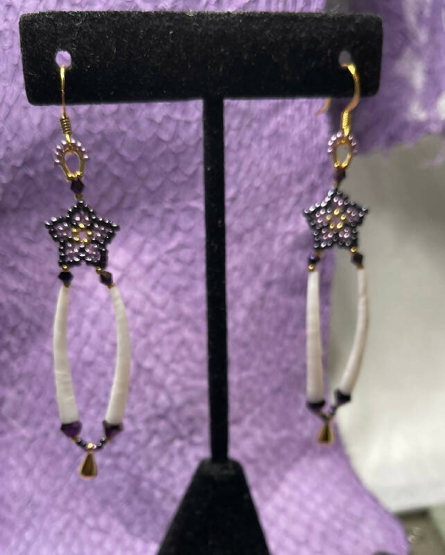 24k gold and lavender Charlotte cut size 15 and dark purple Toho size 15 with dentalium and 2 sizes of crystals with gold teardrop bead on gold filled hooks. Measures 3 1/4” top to bottom