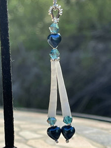 Dentalium earrings w/Blue pearl hearts, medium blue Australian crystals, size 15 and 11 sterling silver beads. On hypoallergenic hooks.